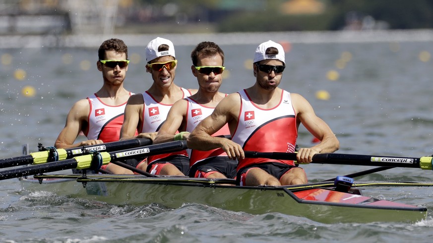 Lucas Tramer, Simon Schuerch, Simon Niepmann, and Mario Gyr, of Switzerland, row for gold in the men&#039;s rowing lightweight four final during the 2016 Summer Olympics in Rio de Janeiro, Brazil, Thu ...