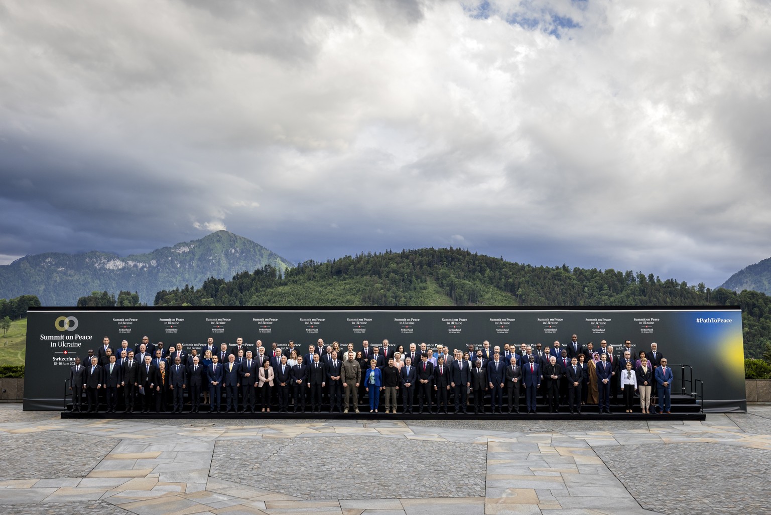 epa11413610 World leaders and heads of delegations pose for the official group photo during the Summit on Peace in Ukraine, in Stansstad near Lucerne, Switzerland, 15 June 2024. International heads of ...