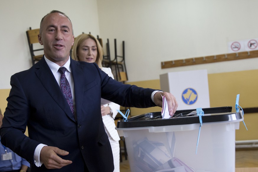 Ramush Haradinaj, candidate for Prime Minister, casts his ballot during the early parliamentary elections Pristina, Kosovo, Sunday, June 11, 2017. Voters in Kosovo have started to cast their ballots i ...