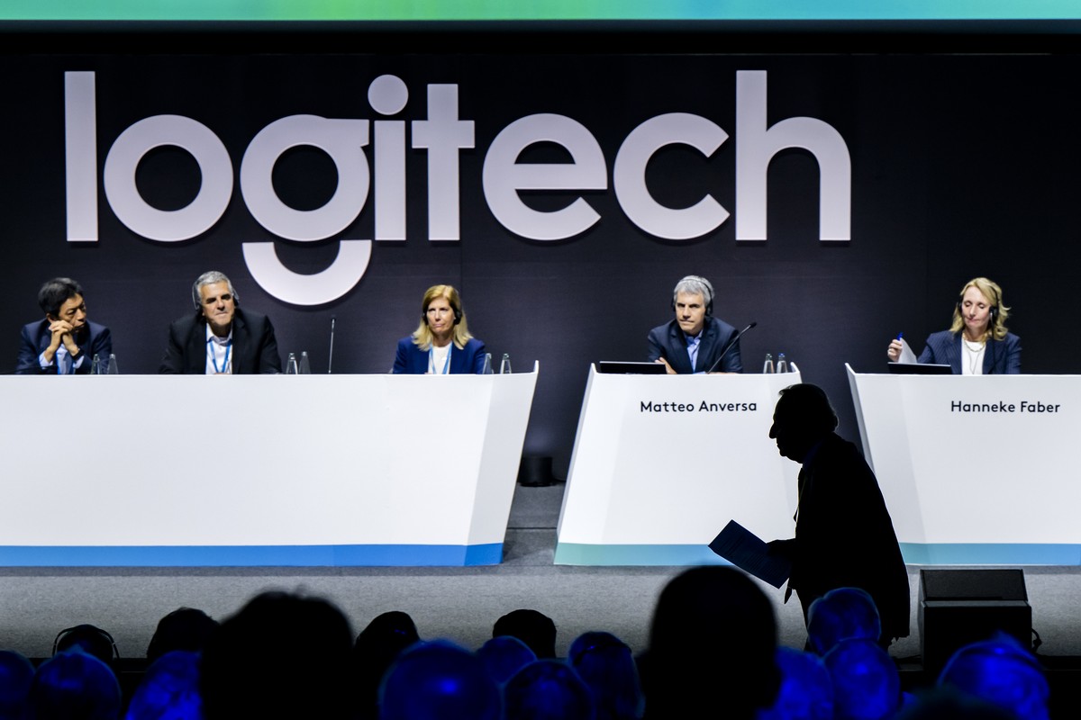 Daniel Borel, co-founder of Logitech, (pictured in the shadows) walks during the Annual General Meeting of Logitech at the SwissTech Convention Center, in Ecublens near Lausanne, Switzerland, Wednesda ...