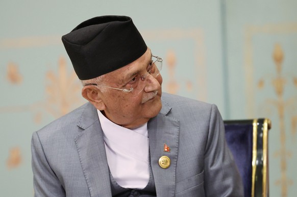 epa12343956 Nepalese Prime Minister Khadga Prasad Sharma Oli attends a meeting with Russian President Vladimir Putin (not pictured) on the sidelines of the Shanghai Cooperation Organisation (SCO) summ ...