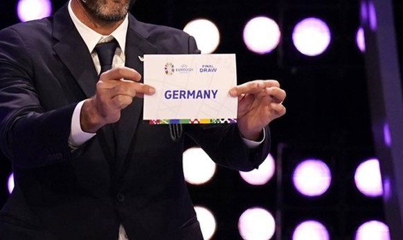 UEFA EURO, EM, Europameisterschaft,Fussball 2024 Draw - Elbphilharmonie Hamburg Official UEFA Euro 2024 mascot Albart right presents the name Germany to former Italy s Gianluigi Buffon during the UEFA ...