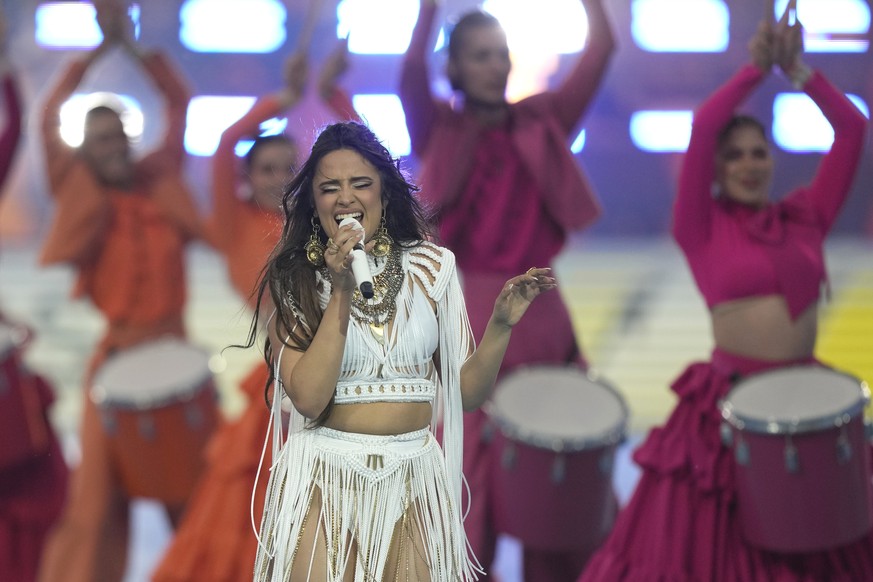 Camila Cabello performs before the Champions League final soccer match between Liverpool and Real Madrid at the Stade de France in Saint Denis near Paris, Saturday, May 28, 2022. (AP Photo/Frank Augst ...