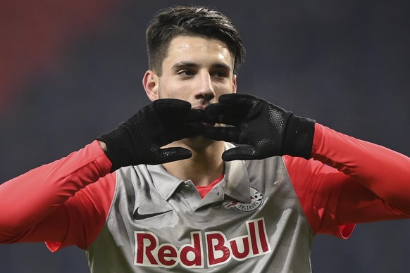 epa08873240 Salzburg&#039;s Dominik Szoboszlai reacts during the UEFA Champions League group A soccer match between FC Salzburg and Atletico Madrid in Salzburg, Austria, 09 December 2020. EPA/Christia ...