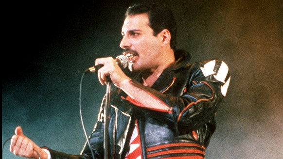 FILE - In this 1985 file photo, singer Freddie Mercury of the rock group Queen, performs at a concert in Sydney, Australia. Queen guitarist Brian May says an asteroid in Jupiter&#039;s orbit has been  ...