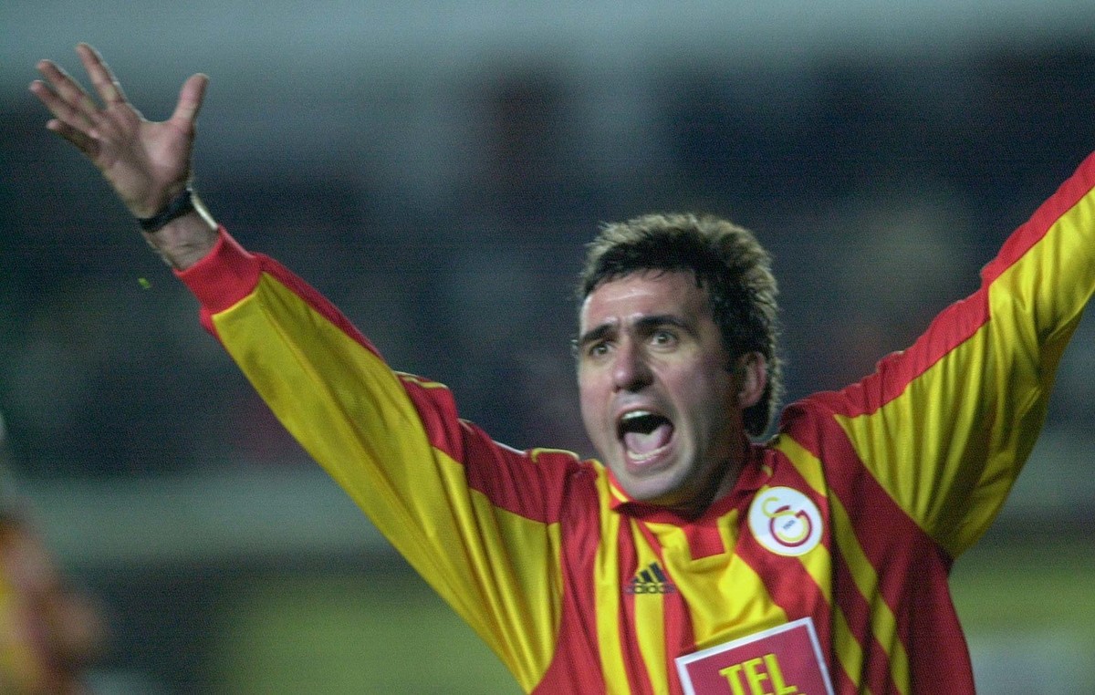 Galatasaray's Romanian midfielder Gheorghe Hagi rejoices after he scored a goal against AC Milan during their soccer Champions League group B match in Istanbul on Wednesday, March 7, 2001. (KEYST ...