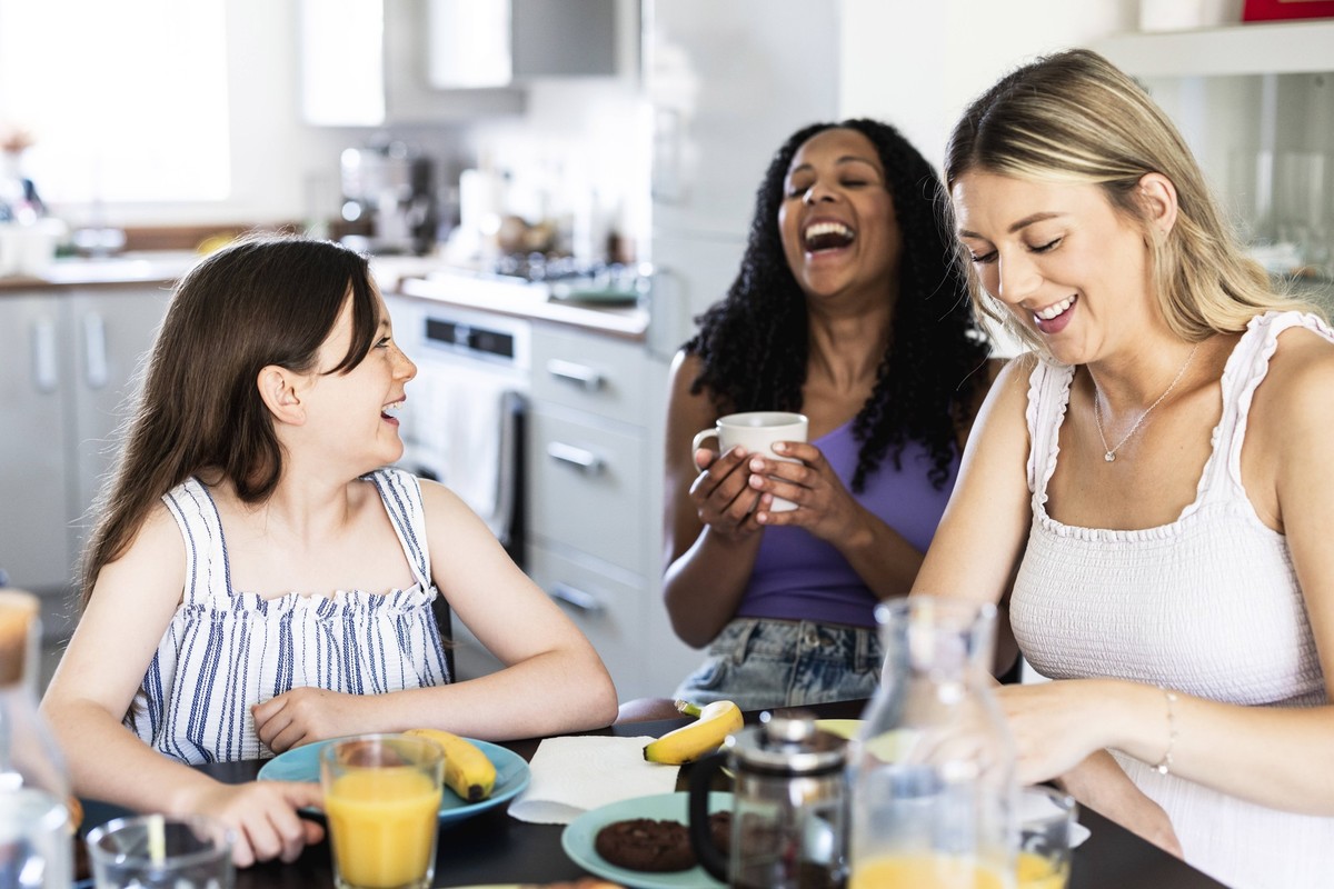 Cheerful family talking and having fun at home model released, Symbolfoto property released, WPEF08397