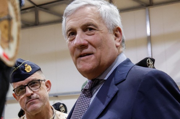 epa12609576 Italy?s Minister for Foreign Affairs Antonio Tajani (R) meets with Italian soldiers at the Italian Military Support Base (BMIS) during a visit to the Italian military contingent engaged in ...