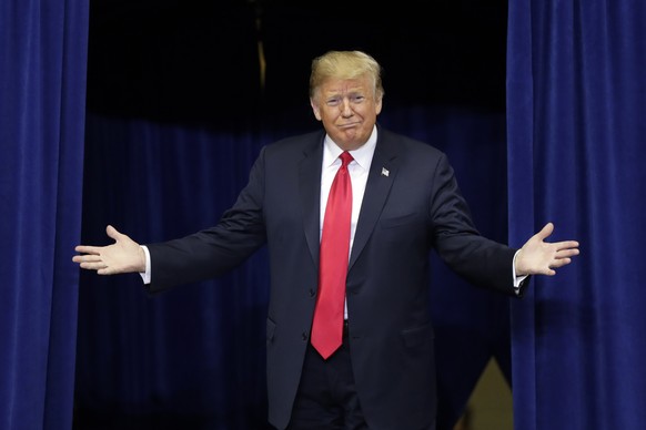 President Donald Trump speaks at a campaign rally at the Allen County War Memorial Coliseum in Fort Wayne, Ind., Monday, Nov. 5, 2018. (AP Photo/Michael Conroy)