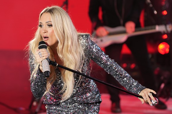 Carrie Underwood performs during the Times Square New Year&#039;s Eve celebration on Tuesday, Dec. 31, 2024, in New York. (Photo by Charles Sykes/Invision/AP)
Carrie Underwood