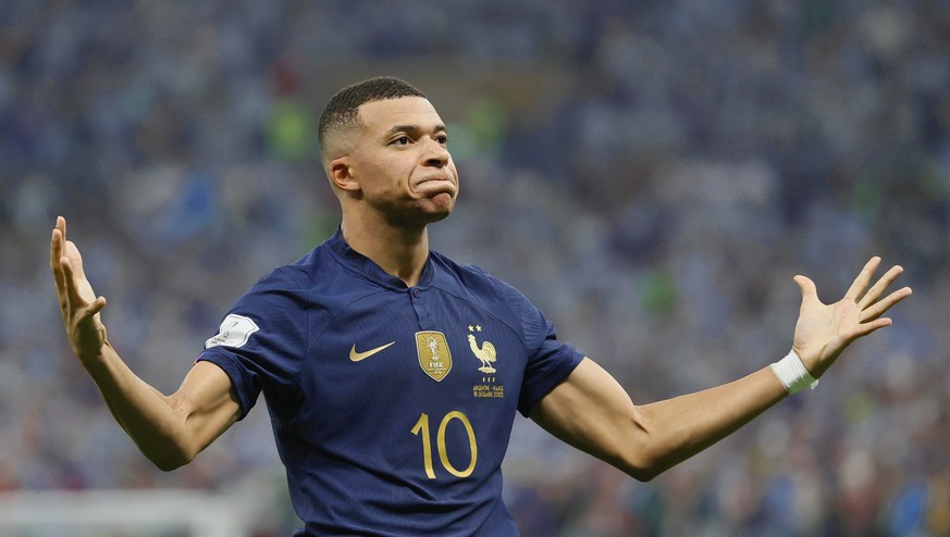 epa10372542 Kylian Mbappe of France celebrates after scoring the 2-2 equalizer during the FIFA World Cup 2022 Final between Argentina and France at Lusail stadium, Lusail, Qatar, 18 December 2022. EPA ...