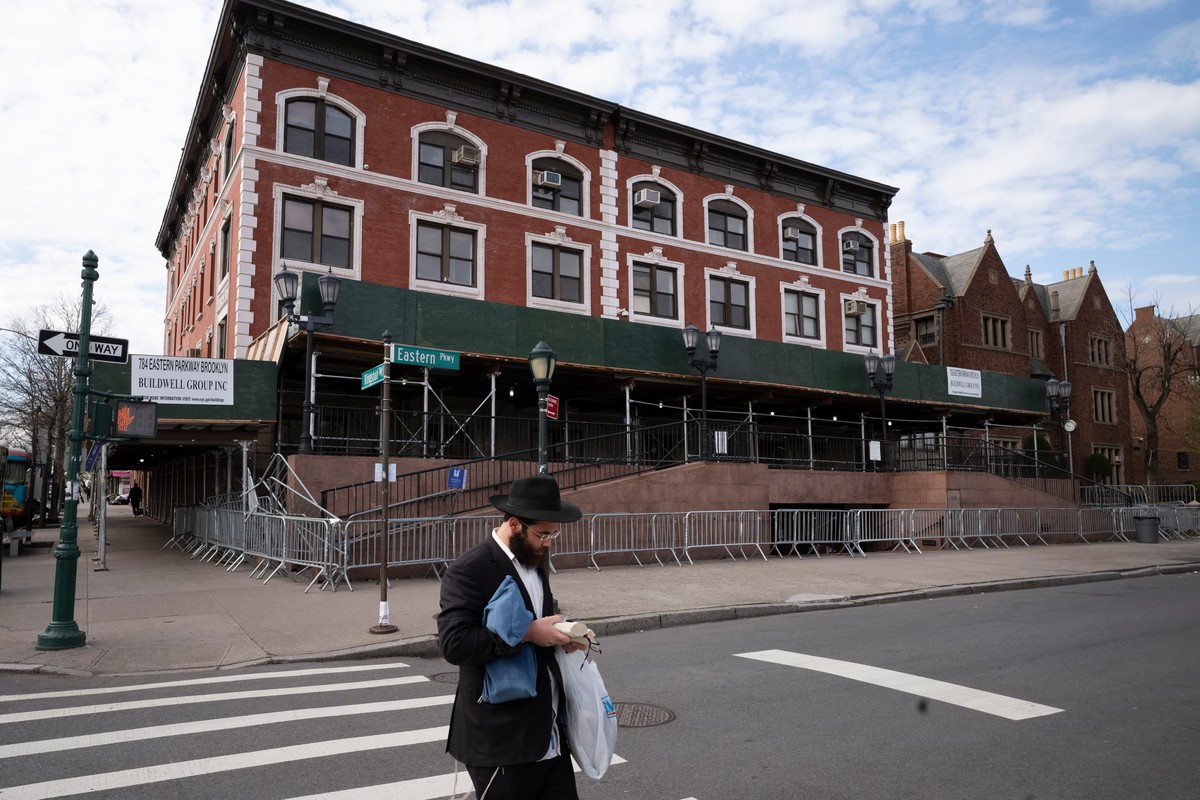 FILE - A man passes the Chabad-Lubavitch World Headquarters in the Crown Heights neighborhood of Brooklyn, April 7, 2020 in New York. (AP Photo/Mark Lennihan, File)
Chabad Headquarters Car Crash