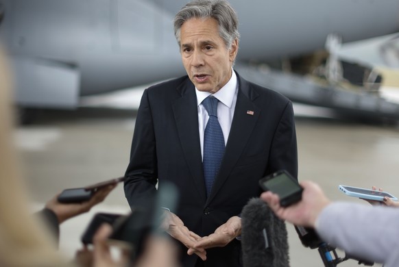 U.S. Secretary of State Antony Blinken speaks with journalists prior to boarding a plane to travel to Brussels for meetings with NATO counterparts, a day after his unannounced visit to Ukraine, at Rze ...