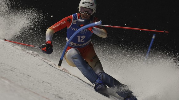 Switzerland&#039;s Michelle Gisin speeds down the course during an alpine ski, women&#039;s World Cup slalom, in Courchevel, France, Thursday, Dec. 21 2023. (AP Photo/Marco Trovati)