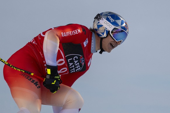 epa11073724 Marco Odermatt of Switzerland reacts in the finish area during the Men&#039;s downhill race at the FIS Alpine Skiing World Cup in Wengen, Switzerland, 13 January 2024. EPA/PETER SCHNEIDER