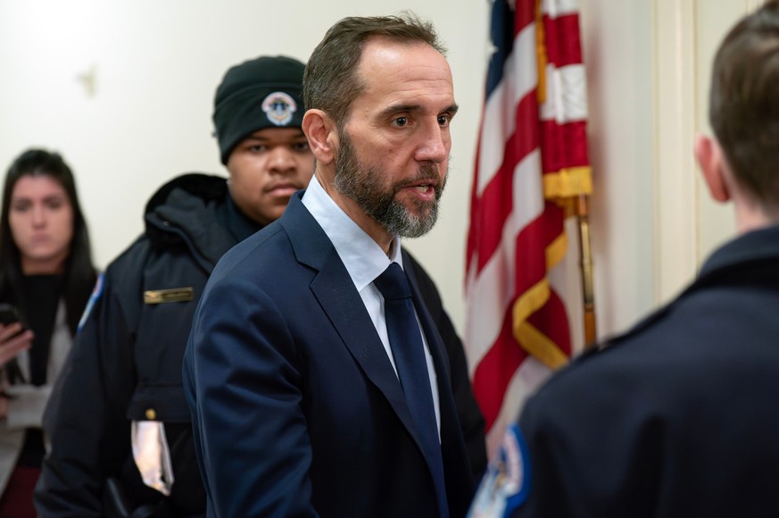 Former Department of Justice Special Counsel Jack Smith walks back after a break for a closed-door interview with House Republicans at Capitol Hill, Wednesday, Dec. 17, 2025, in Washington. (AP Photo/ ...