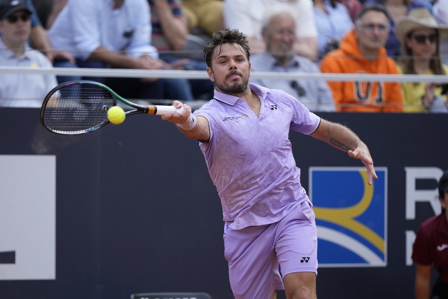 Switzerland&#039;s Stan Wawrinka returns the ball to Bulgaria&#039;s Grigor Dimitrov during their match at the Italian Open tennis tournament, in Rome, Friday, May 12, 2023. (AP Photo/Andrew Medichini ...