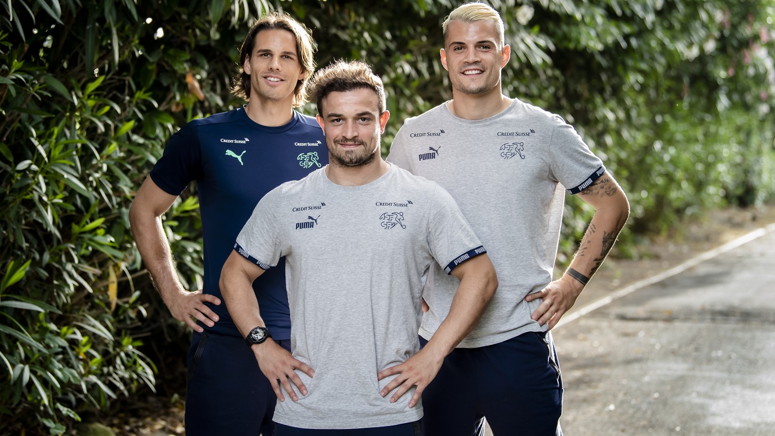 Switzerland&#039;s goalkeeper Yann Sommer, left, Switzerland&#039;s midfielder Xherdan Shaqiri, center, Switzerland&#039;s midfielder Granit Xhaka, right, pose during an interview with journalists dur ...