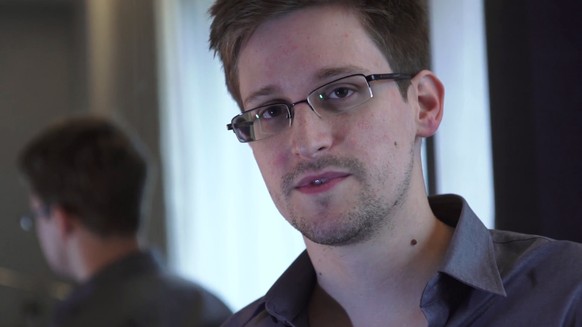 epa07841832 (FILE) - A video grab courtesy of The Guardian newspaper showing former CIA employee Edward Snowden during an exclusive interview with the newspaper's Glenn Greenwald and Laura Poitras in  ...