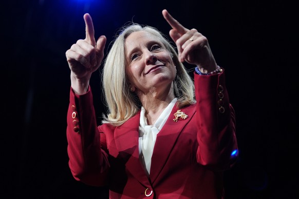FILE - Democrat Abigail Spanberger points out at the crowd after she was declared the winner of the Virginia governor&#039;s race during an election night watch party in Richmond, Va., Nov. 4, 2025. ( ...