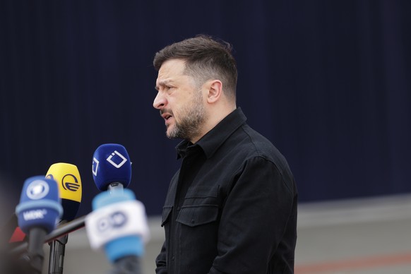 Ukraine's President Volodymyr Zelenskyy speaks with the media as he arrives for a meeting of the European Political Community in Yerevan, Armenia, Monday, May 4, 2026. (AP Photo/Anthony Pizzoferr ...