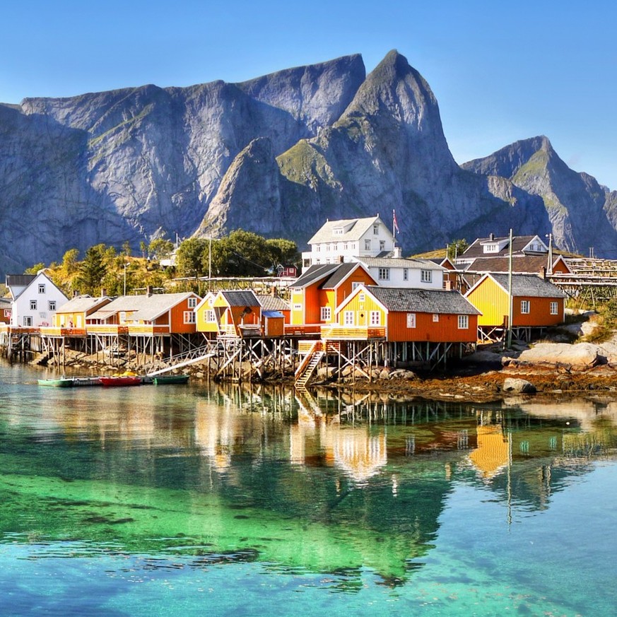 Lofoten Islands, Fjords, Arctic, Norway, Scenic green Reinefjord and Reine village on Lofoten islands. Arctic Norway.