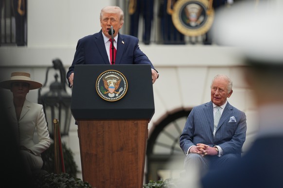 Britain's King Charles III listens to President Donald Trump speak during an arrival ceremony on the South Lawn of the White House, Tuesday, April 28, 2026, in Washington. (AP Photo/Julia Demaree ...