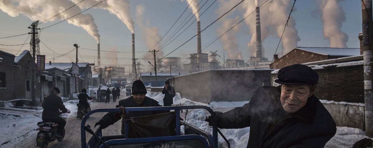 In this image released by World Press Photo titled "China's Coal Addiction" by photographer Kevin Frayer for Getty Images which won first prize in the Daily Life singles category shows  ...