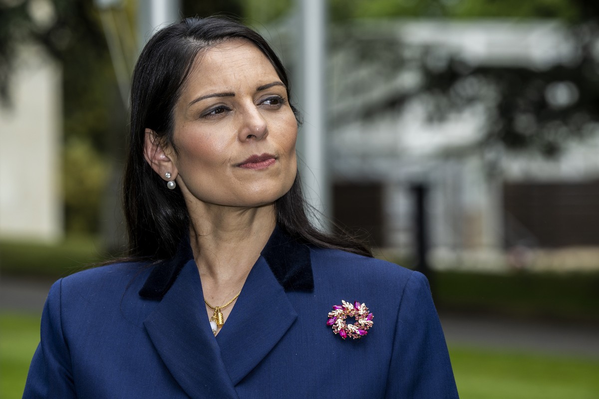 Britain's Home Secretary Priti Patel speaks during an interview with the Associated Press at the European headquarters of the United Nations in Geneva, Switzerland, Thursday, May 19, 2022. (Marti ...