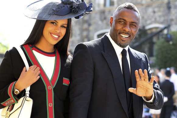 Idris Elba and Sabrina Dhowre arrive for the wedding ceremony of Prince Harry and Meghan Markle at St. George&#039;s Chapel in Windsor Castle in Windsor, near London, England, Saturday, May 19, 2018.  ...