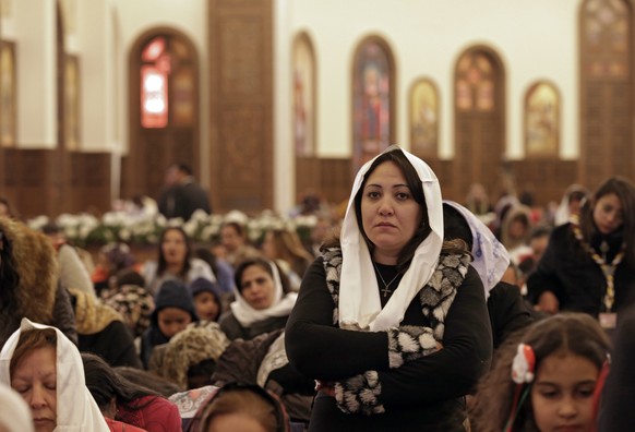 epa07266148 Egyptian Coptic Christians attend a Christmas Eve mass at the newly inaugurated Cathedral of Nativity in the New Administrative Capital, Egypt, 06 January 2019. The Middle East&#039;s bigg ...