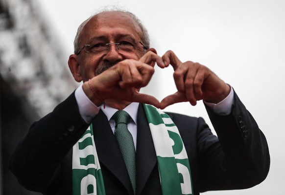 epa10621212 Turkish presidential candidate Kemal Kilicdaroglu, leader of the opposition Republican People's Party (CHP), gestures during his election campaign event in Bursa, Turkey, 11 May 2023. ...