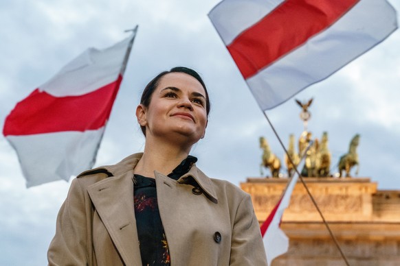 epa08764255 (FILE) - Belarusian opposition leader Svetlana Tikhanovskaya attends a protest against the political situation in Belarus in front of the Brandenburg Gate in Berlin, Germany, 05 October 20 ...