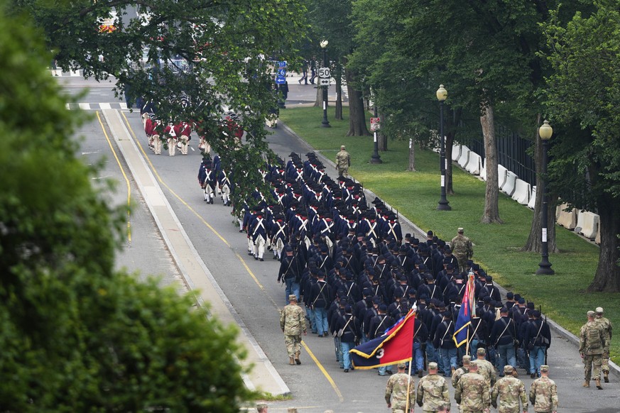 A military parade commemorating the Army's 250th anniversary, coinciding with President Donald Trump's 79th birthday, Saturday, June 14, 2025, in Washington. (AP Photo/Stephanie Scarbrough)
...