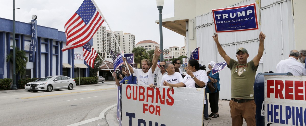 FILE - In this Oct. 28, 2016 file photo, Cuban-Americans chant pro-Trump slogans as they show their support for Republican presidential candidate Donald Trump, in Miami. According to a poll released o ...
