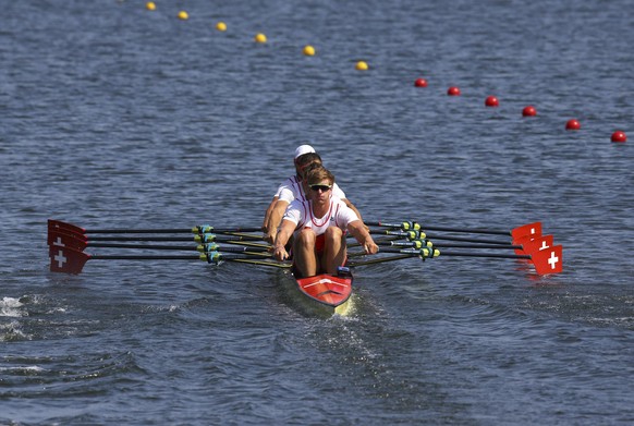 2016 Rio Olympics - Rowing - Preliminary - Lightweight Men&#039;s Four Heats - Lagoa Stadium - Rio De Janeiro, Brazil - 06/08/2016. The Swiss team of Lucas Tramer (SUI) of Switzerland, Simon Schurch ( ...