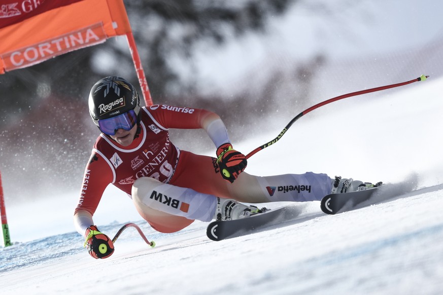 Switzerland&#039;s Lara Gut Behrami speeds down the course during an alpine ski, women&#039;s World Cup downhill race, in Cortina d&#039;Ampezzo, Italy, Friday, Jan. 20, 2023. (AP Photo/Gabriele Facci ...