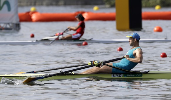 Vladislav Yakovlev, of Kazakhstan, competes in the men&#039;s single scull heat during the 2016 Summer Olympics in Rio de Janeiro, Brazil, Saturday, Aug. 6, 2016. (AP Photo/Andre Penner)