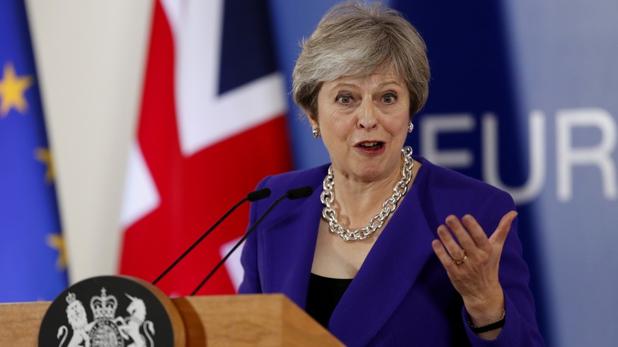 British Prime Minister Theresa May speaks during a media conference at an EU summit in Brussels, Thursday, Oct. 18, 2018. EU leaders met for a second day on Thursday to discuss migration, cybersecurit ...