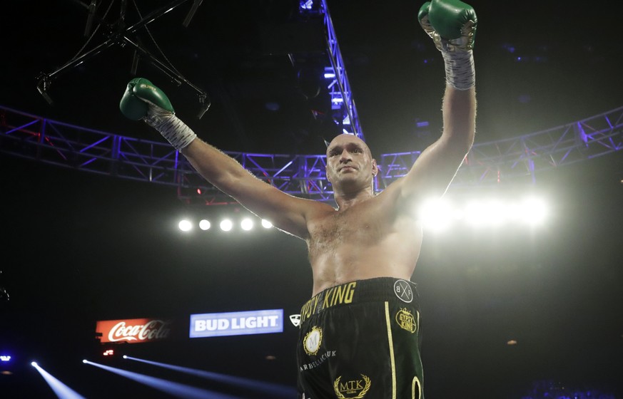 Tyson Fury, of England, celebrates during a WBC heavyweight championship boxing match against Deontay Wilder Saturday, Feb. 22, 2020, in Las Vegas. (AP Photo/Isaac Brekken)