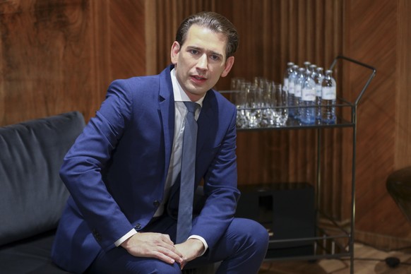 In this handout photo released by Russian Foreign Ministry Press Service, Austria&#039;s Chancellor Sebastian Kurz listens to Russian Foreign Minister Sergey Lavrov during their talks in Vienna, Austr ...