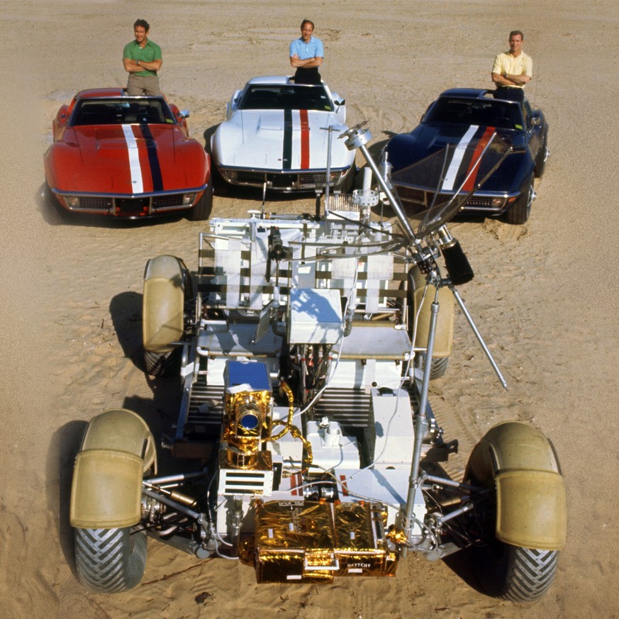 Astronauts James Irwin, Alfred Worden and David Scott (L-R) with their 1971 red, white and blue Corvettes, and the Lunar Roving Vehicle (moon buggy) to be used in the Apollo 15 mission. 
https://www.g ...