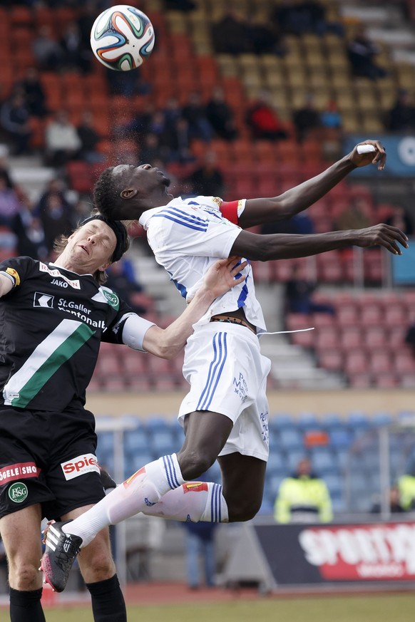 St Gallen&#039;s Philippe Montandon, left, fights for the ball with Lausanne-Sport&#039;s Yaya Banana, right, during the Super League soccer match of Swiss Championship between FC Lausanne-Sport and F ...