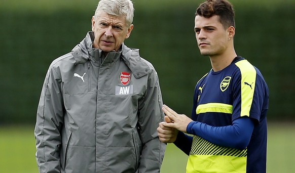 Britain Soccer Football - Arsenal Training - Arsenal Training Ground - 27/9/16
Arsenal manager Arsene Wenger and Granit Xhaka during training
Action Images via Reuters / Andrew Couldridge
Livepic
 ...