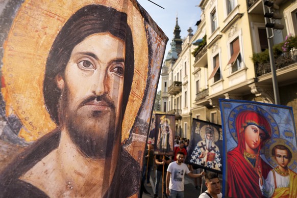 People march during a protest against the international LGBT event Euro Pride in Belgrade, Serbia, Sunday, Aug. 28, 2022. Members of the European Pride Organizers Association chose Serbia&#039;s capit ...