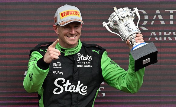 epaselect epa12220742 Kick Sauber driver Nico Hulkenberg of Germany celebrates after his third place finish at the Formula 1 British Grand Prix at the at the Silverstone Circuit racetrack, Britain, 06 ...