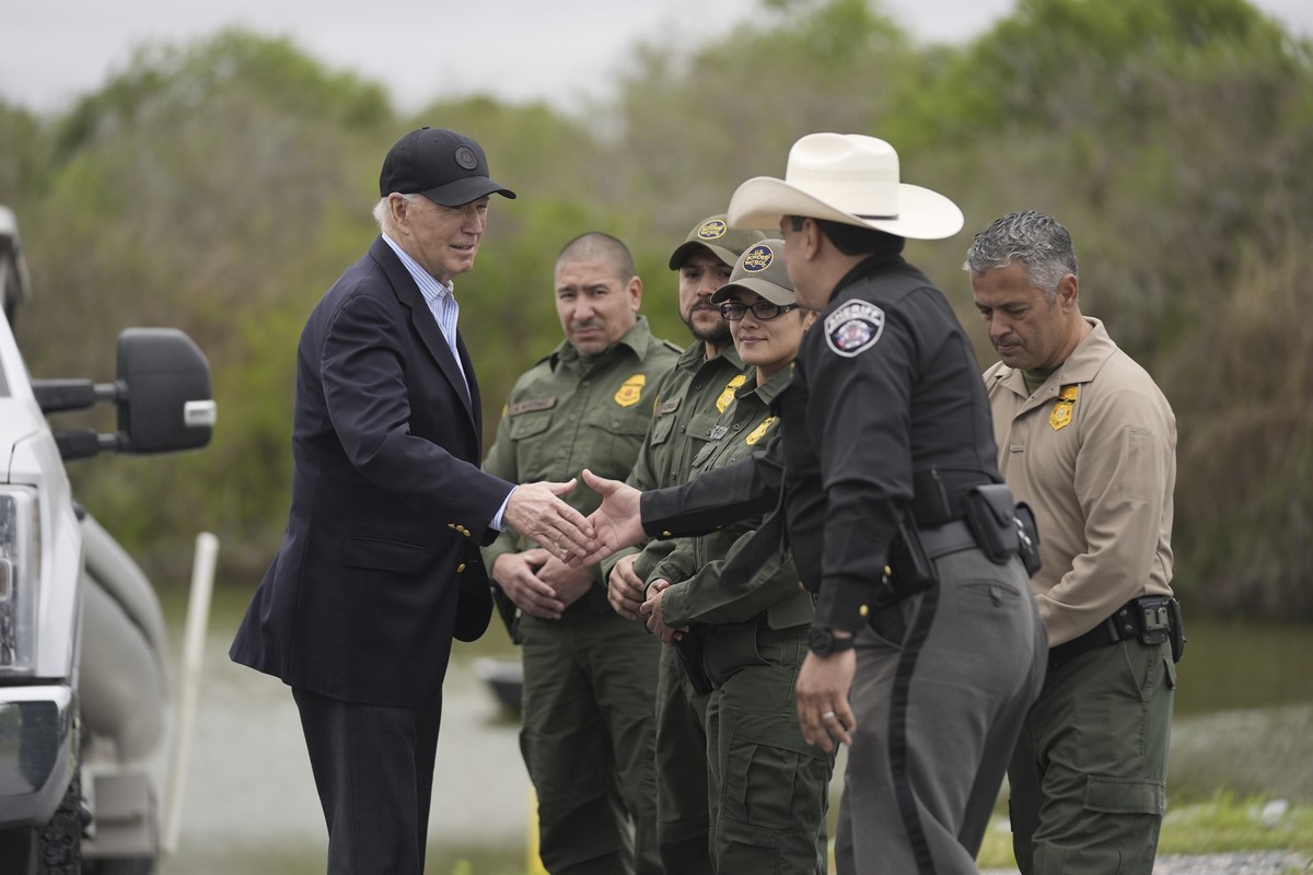 FILE - President Joe Biden talks with the U.S. Border Patrol and local officials, as he looks over the southern border, Feb. 29, 2024, in Brownsville, Texas, along the Rio Grande. Biden's migrati ...
