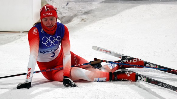 epa09738333 Nadine Faehndrich of Switzerland reacts after the Women&#039;s Individual Sprint final at the Zhangjiakou National Cross-Country Skiing Centre at the Beijing 2022 Olympic Games in Zhangjia ...
