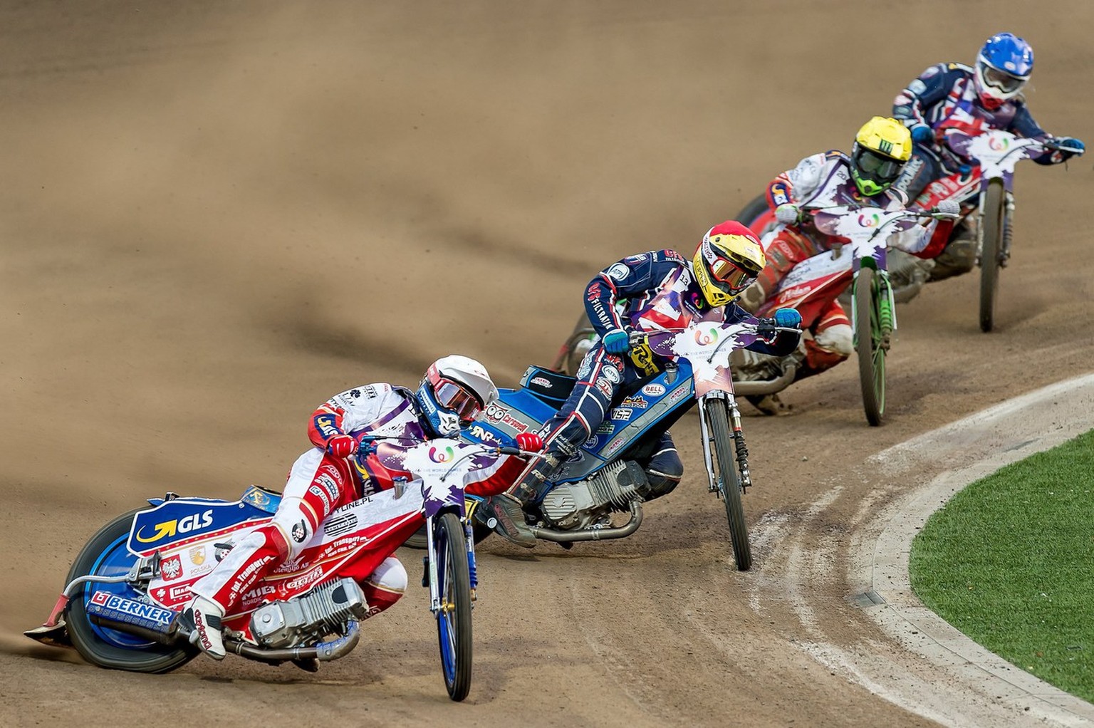 epa06260383 YEARENDER 2017 JULY..Bartosz Zmarzlik (white) and Maciej Janowski (yellow) of Poland and Craig Cook (red) and Robert Lambert (blue) of Great Britain in action during the Speedway Team Men  ...