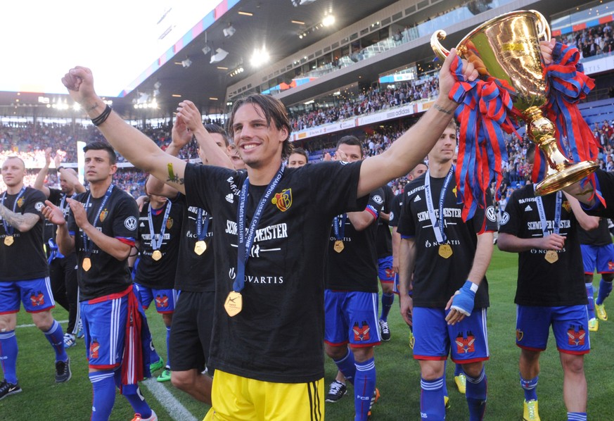 BASEL SWITZERLAND - MAY 18: Yann Sommer of FC Basel celebrate with the cup after the Raiffeisen Super League match between FC Basel and FC Lausanne Sport at St. Jakob-Park stadium on May 18, 2014 in B ...